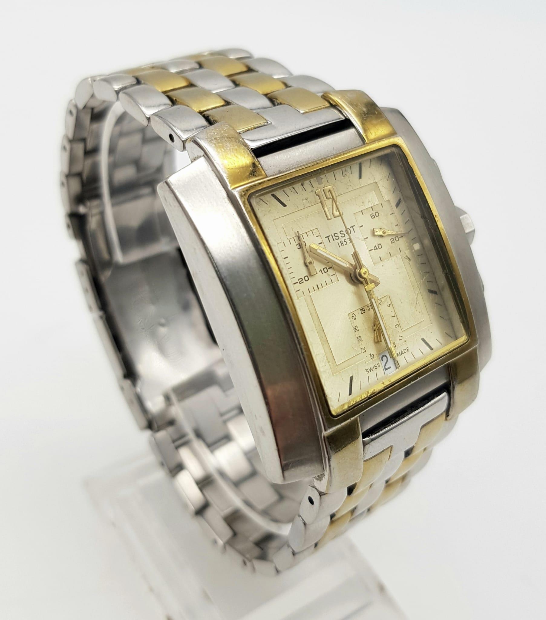 A Tissot 1853 Chronograph Gents Watch. Two-tone strap and case - 35mm. Gold tone dial with three sub - Image 2 of 5