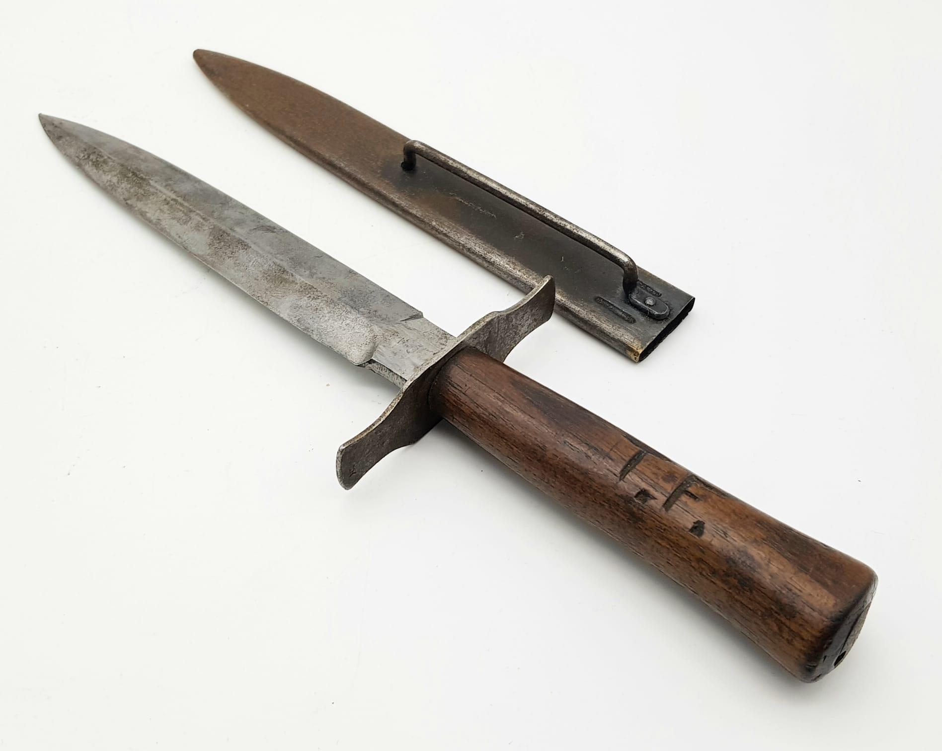 WW2 German Luftwaffe Pilots Boot Knife/Dagger. Wooden grip with tang secured by pins/rivets and a - Image 2 of 5