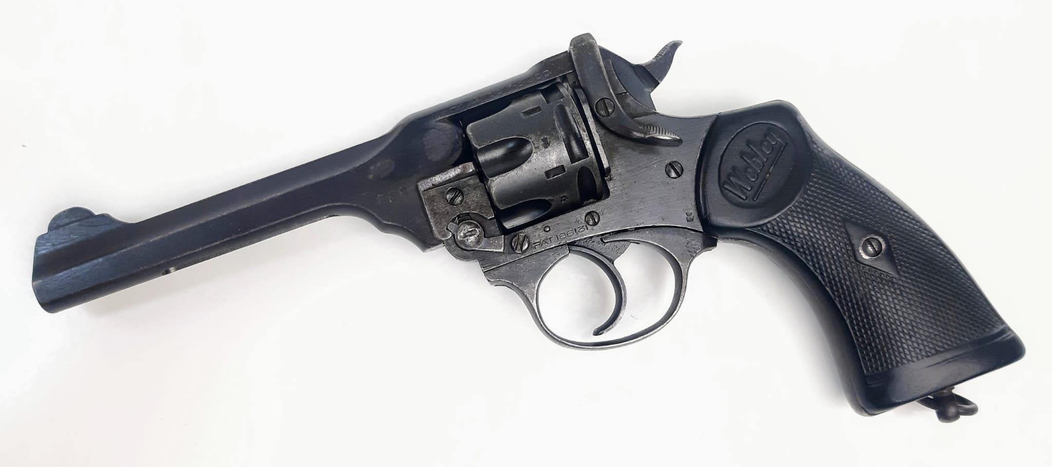 A Deactivated Webley Mark IV - 145/200 War Finish (government contract) Revolver Pistol. This WW2 - Image 2 of 10