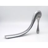 A rare aluminium shoe-horn of large proportions designed and signed by MANOLO BLAHNIK. Manuel (