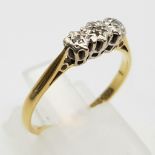 A Vintage 18K Yellow Gold and Diamond Trilogy Ring. Size O/P. 2.42g total weight.