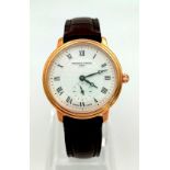 A Frederique Constant Ladies Slimline Watch. Brown leather strap. Gold plated case - 28mm. White