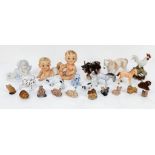A small collection of porcelain animals and figures - including babies and farmyard animals.