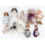 A collection of 10 varied porcelain dolls.
