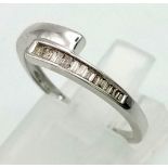 9k White Gold Crossover Ring with Channel Set Diamonds. 1.4grams . Size N