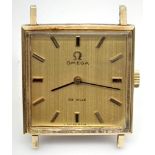 A VINTAGE 9K GOLD OMEGA MANUAL MOVEMENT WATCH WITH SQUARE FACE 2 X 2cms APPROX, OVERWOUND. A/F