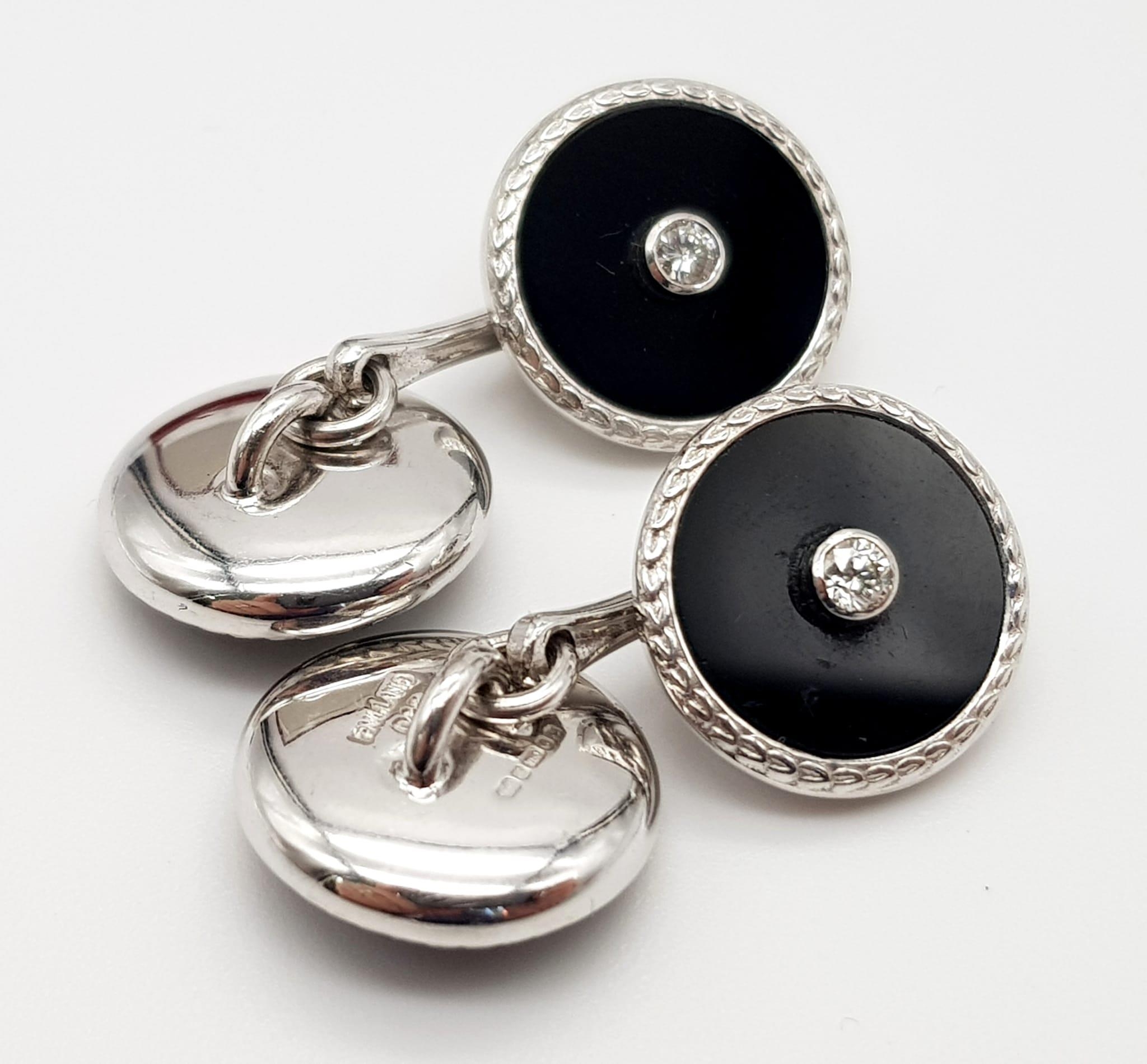 A Pair of Edwardian 18K White Gold Diamond and Onyx Cufflinks. Makers mark of Deakin and Francis. - Image 2 of 5