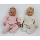 A pair of Re-Born silicone lifelike dolls. In excellent condition.