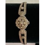 VINTAGE FAVRE LEUBA CRYSTAL BRACELET WATCH having jewelled spring flip top with face showing