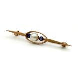 An Antique Victorian 9K Gold, Pearl and Sapphire bar Brooch. 4.5cm. 1.8g total weight.