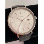 Gentlemans quartz wristwatch with face marked PAUL SMITH. Having large silver white face with