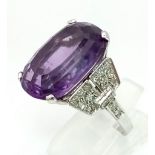 A SPECTACULAR AMETHYST AND DIAMOND RING SET IN 18K WHITE GOLD. 8.5gms size Q