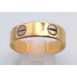 18K YELLOW GOLD CARTIER STYLE LOVE RING. 6G TOTAL WEIGHT. SIZE V
