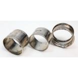 Three Sterling Silver Napkin Rings. Sheffield and Birmingham hallmarks. 75g total weight.