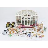 A fabulous dollhouse conservatory - Violets wedding shop! Full of accessories for the big day.