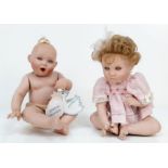 A Pair of Ashton Drake 1995 and 96 real life porcelain dolls. In excellent condition. 45cm