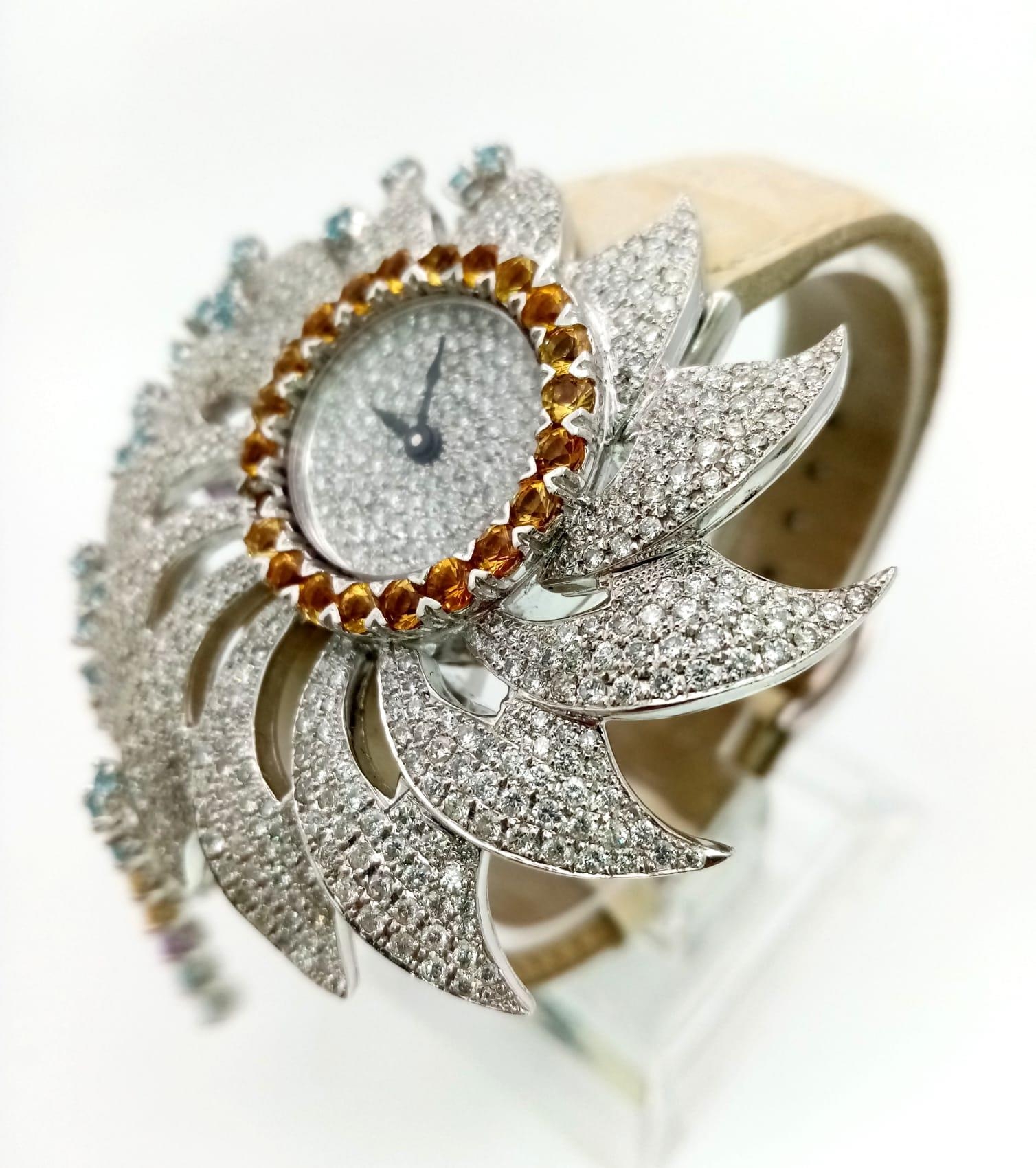 AN 18K WHITE GOLD AND DIAMOND DRESS WATCH BY COBRA , DIAMOND RAYS AND BEZEL. ONE SMALL CITRINE - Image 3 of 4
