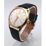 A 1950'S GENTS 18K ROSE GOLD OMEGA IN LOVELY CONDITION ON ALEATHER STRAP. MANUAL WIND.