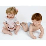 A pair of Ashton Drake 1993 and 94 real-life porcelain dolls. In excellent condition.