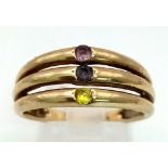 A 9K Yellow Gold Three Gem Band Ring. Amethyst, Peridot and Pink Topaz. Size Q/R. 3.34g total weight