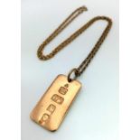 A Vintage 9K Gold Ingot Pendant on a 9K Gold Chain. 4cm and 52cm. 20.89g total weight.