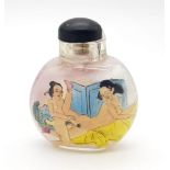 A 19th century Chinese crystal glass snuff bottle with inside painted erotic pictures to front and