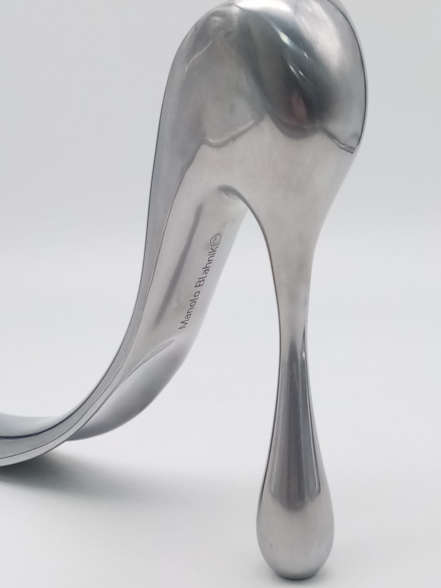 A rare aluminium shoe-horn of large proportions designed and signed by MANOLO BLAHNIK. Manuel ( - Image 2 of 3