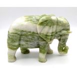 A wonderful 3.5 kilo hand-carved Green and White jade Elephant that would make the perfect centre-