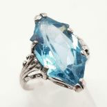 A Gorgeous 18K White Gold and Large Elongated Hexagonal Blue Topaz Ring. Size O. 5.77g total weight.