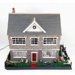 A Breath-Taking Dollhouse that is wonderfully decorated - with lots of accessories. Fully wired.