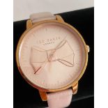 Ladies TED BAKER Quartz wristwatch. Brook model TEC185001.Having pale pink dial and gold tone case .