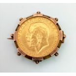 A 22k Gold 1925 George V Full Sovereign Coin in a 9K Gold Casing. 10.45 g total weight. Two small