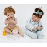 A pair of Ashton Drake 1994 and 99 real-life porcelain dolls. In excellent condition. 50cm.