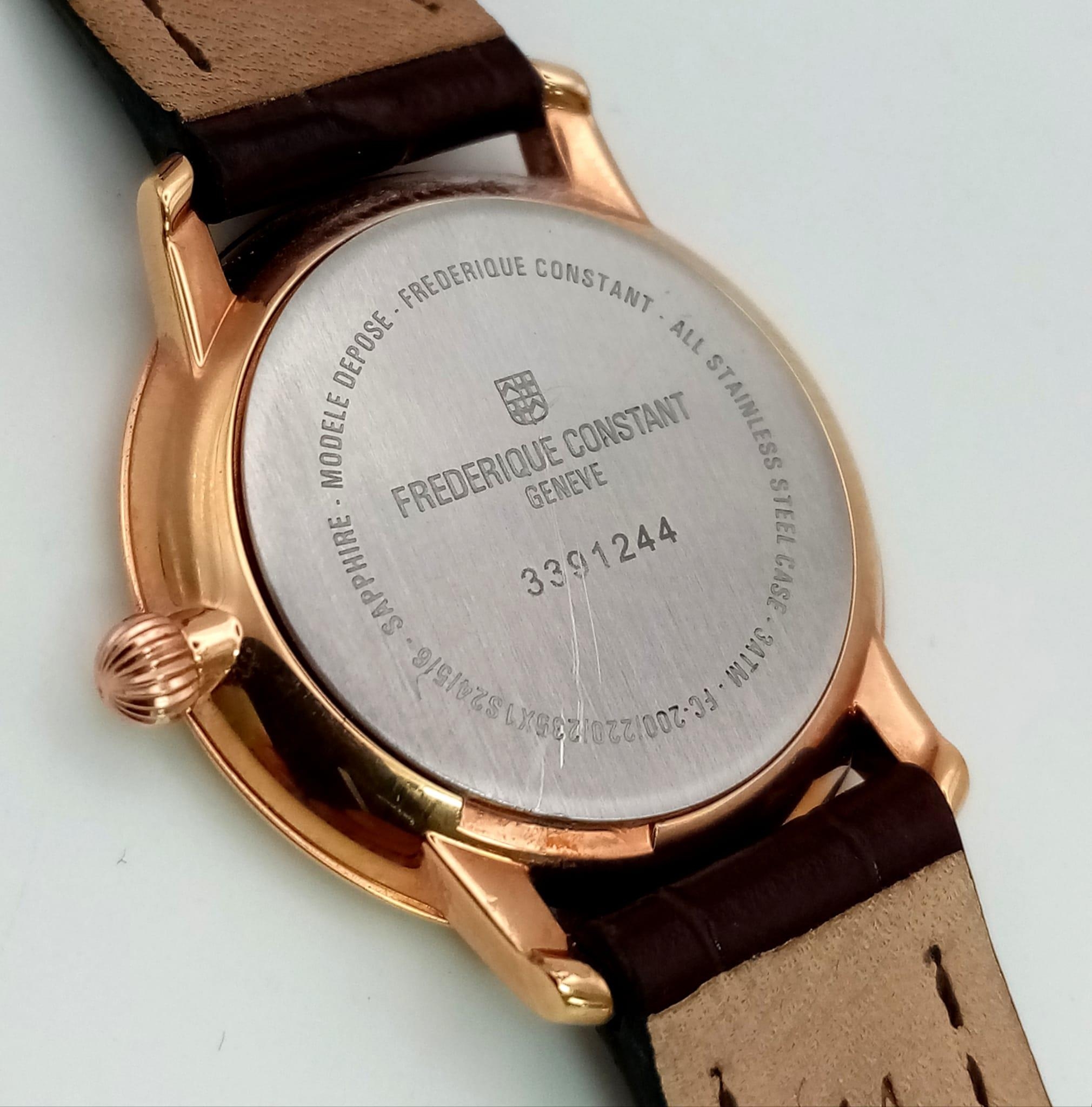A Frederique Constant Ladies Slimline Watch. Brown leather strap. Gold plated case - 28mm. White - Image 3 of 4