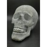 A DECORATIVE SKULL 20 X 26cms