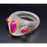 A Frosted Quartz Ruby Trilogy Ring. Burmese-pink coloured rubies. Size M/N.