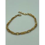 SILVER TENNIS/LINE BRACELET,set with TOURMALINE and small DIAMONDS. Gilded to appear as gold. 19 cm.