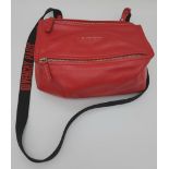 A Givenchy Pandora Red Leather Crossbody Bag. Two zipped compartments. 25 x 15cm. In good