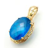 A Beautiful Sky-Blue Faceted Large Topaz Pendant set in 14K Yellow Gold. 20ct topaz. 8.06g total