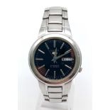 A Vintage Seiko 5 Automatic Gents Watch. Stainless steel strap and case - 37mm. Black dial with