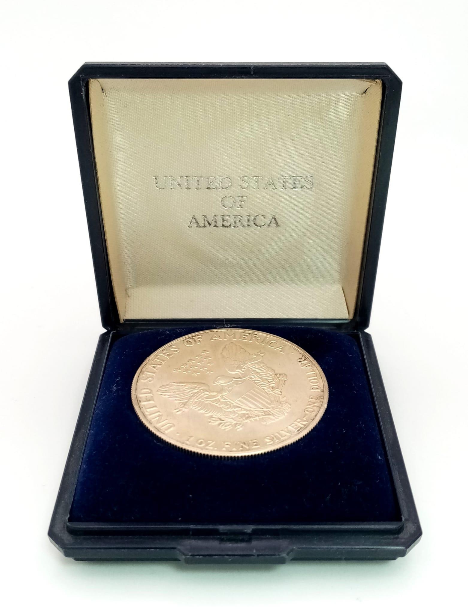 A USA 1986 Silver One Dollar Coin. 31.4g. In original presentation box. - Image 3 of 6