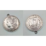 An American silver Dollar pendant, dated 1902 in very good condition. Diameter: 38 mm, weight: 28 g.