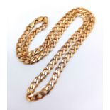 A 9K Yellow Gold Flat Curb Link Necklace. 41cm. 13.2g