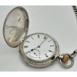 A full hunter H/M silver pocket watch with movement by Thomas McNeil Greenock dated 1894 Chester