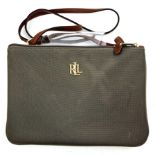 A Ralph Lauren Green Canvas Shoulder Bag. Gilded exterior monogram. Two zipped pockets with monogram