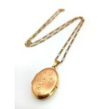 A 9K Yellow Gold Oval Pendant on a 9K Yellow Gold Figaro Necklace. 3 and 40cm. 5.62g