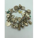 Vintage SILVER CHARM BRACELET absolutely full of interesting SILVER charms to include Victorian