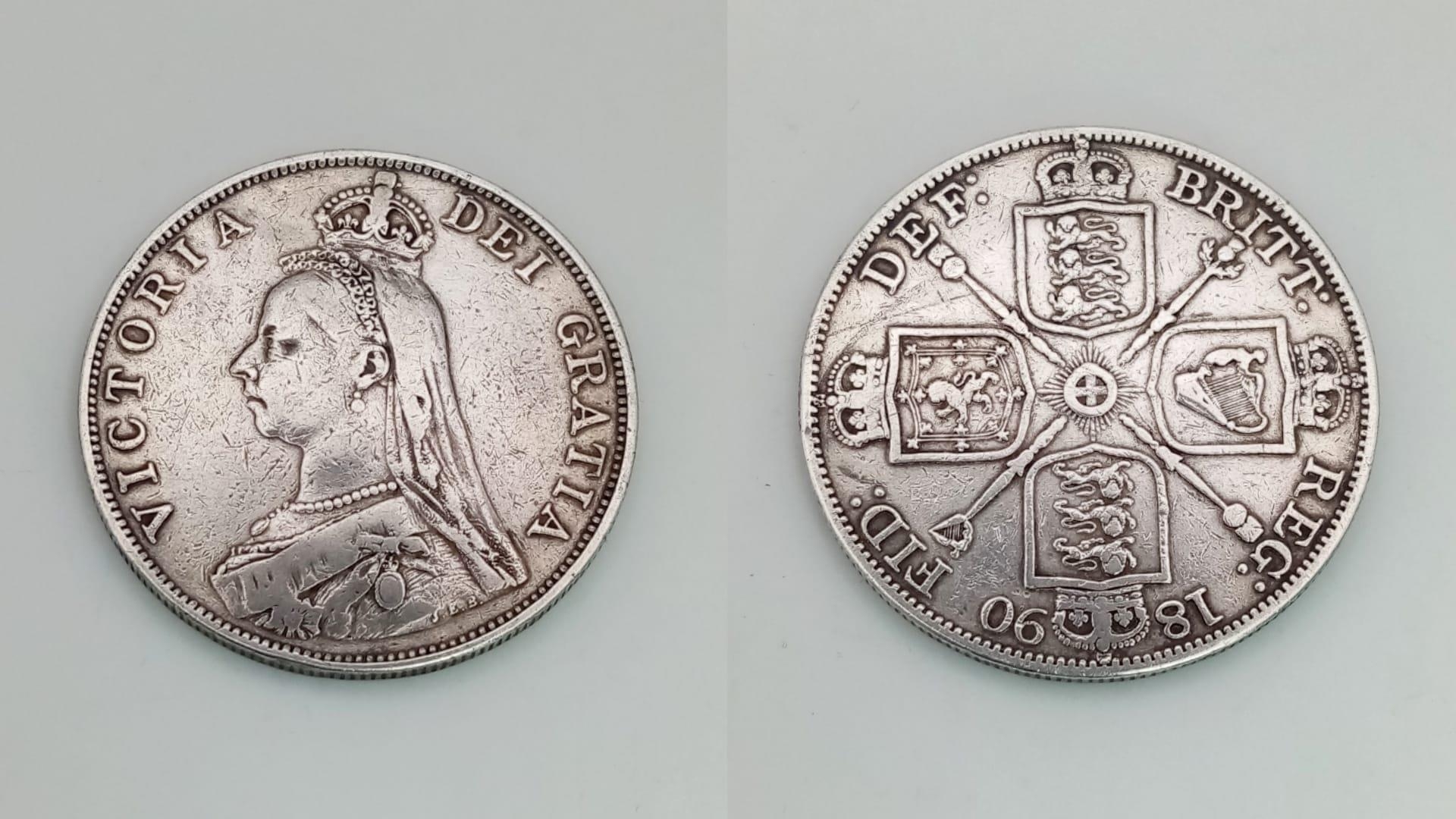 An 1890 Queen Victoria Double Florin Silver Coin. Good definition but please see photos.