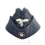 WW2 German Luftwaffe Enlisted Mans/NCO’s Side Cap. The cap with embroidered roundel and Luftwaffe