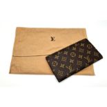A Louis Vuitton Large Wallet. Monogram canvas. Brown leather inner. 20 x 10cm. Comes with a dust